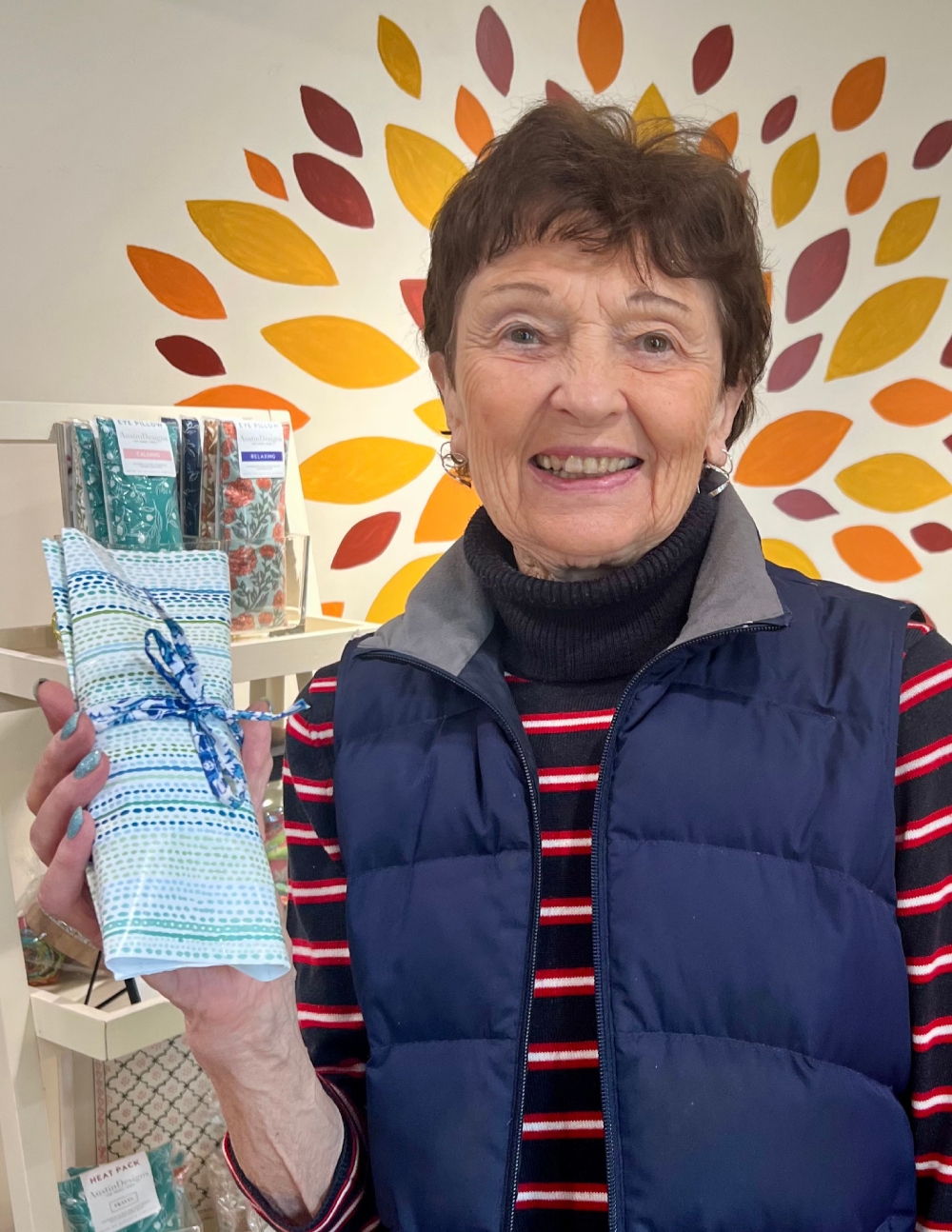 Happy Customer with A Gift Wrapped Scarf